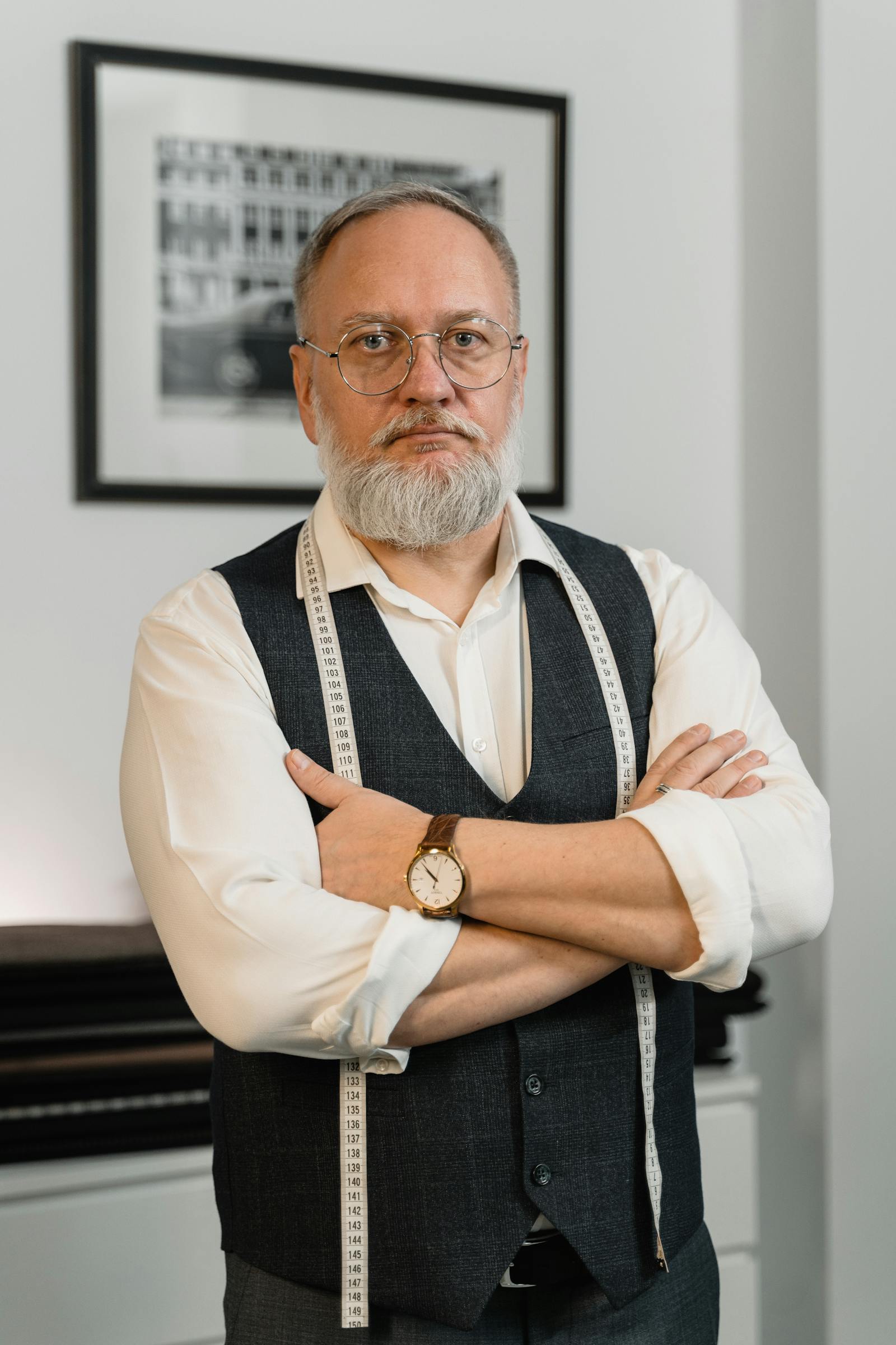 Portrait of a senior designer in his atelier